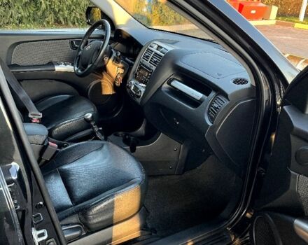 Черный Киа Sportage, объемом двигателя 2 л и пробегом 226 тыс. км за 8800 $, фото 2 на Automoto.ua
