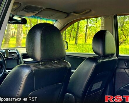 Черный Киа Sportage, объемом двигателя 2 л и пробегом 170 тыс. км за 7999 $, фото 6 на Automoto.ua