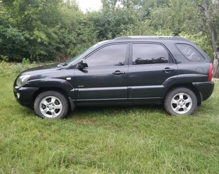 Чорний Кіа Sportage, об'ємом двигуна 2 л та пробігом 248 тис. км за 8600 $, фото 9 на Automoto.ua