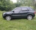 Чорний Кіа Sportage, об'ємом двигуна 2 л та пробігом 248 тис. км за 8600 $, фото 9 на Automoto.ua