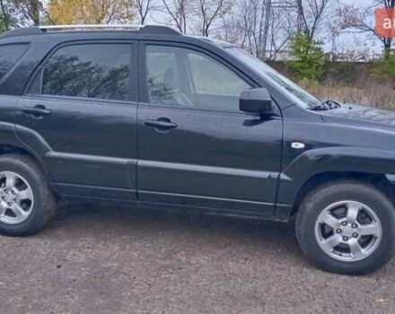 Черный Киа Sportage, объемом двигателя 2 л и пробегом 275 тыс. км за 7600 $, фото 6 на Automoto.ua