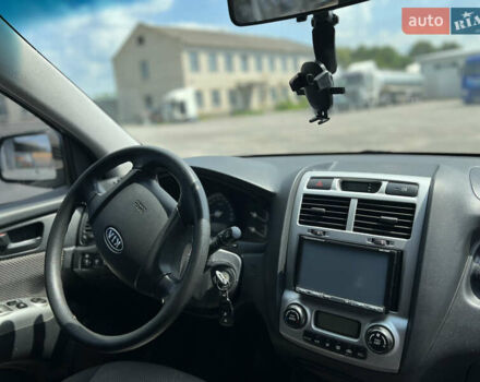 Черный Киа Sportage, объемом двигателя 2 л и пробегом 150 тыс. км за 10000 $, фото 9 на Automoto.ua