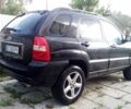 Черный Киа Sportage, объемом двигателя 2 л и пробегом 290 тыс. км за 6400 $, фото 11 на Automoto.ua