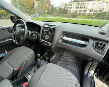 Черный Киа Sportage, объемом двигателя 1.98 л и пробегом 264 тыс. км за 6500 $, фото 40 на Automoto.ua