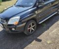 Черный Киа Sportage, объемом двигателя 2 л и пробегом 290 тыс. км за 7650 $, фото 1 на Automoto.ua