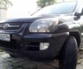 Черный Киа Sportage, объемом двигателя 2 л и пробегом 290 тыс. км за 6400 $, фото 1 на Automoto.ua