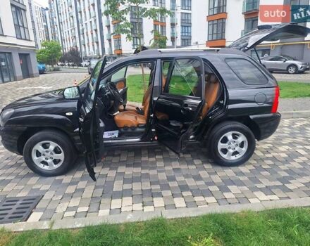 Черный Киа Sportage, объемом двигателя 2 л и пробегом 207 тыс. км за 7950 $, фото 27 на Automoto.ua