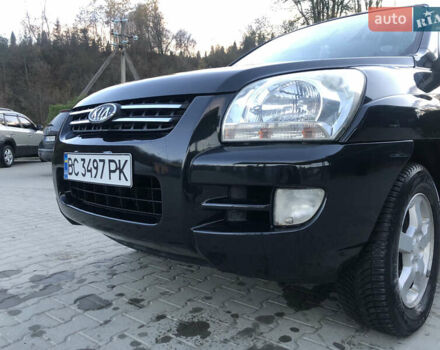 Черный Киа Sportage, объемом двигателя 2 л и пробегом 290 тыс. км за 7200 $, фото 3 на Automoto.ua