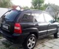 Черный Киа Sportage, объемом двигателя 2 л и пробегом 290 тыс. км за 6400 $, фото 10 на Automoto.ua