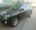 Черный Киа Sportage, объемом двигателя 2 л и пробегом 247 тыс. км за 7500 $, фото 1 на Automoto.ua