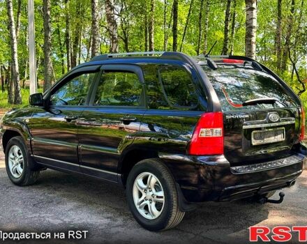 Чорний Кіа Sportage, об'ємом двигуна 2 л та пробігом 170 тис. км за 7999 $, фото 2 на Automoto.ua