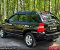 Черный Киа Sportage, объемом двигателя 2 л и пробегом 170 тыс. км за 7999 $, фото 2 на Automoto.ua