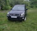 Чорний Кіа Sportage, об'ємом двигуна 2 л та пробігом 248 тис. км за 8600 $, фото 1 на Automoto.ua