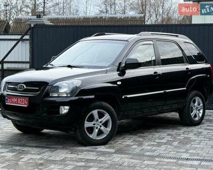 Чорний Кіа Sportage, об'ємом двигуна 2 л та пробігом 215 тис. км за 8600 $, фото 22 на Automoto.ua