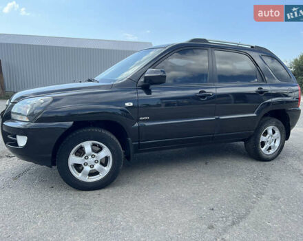 Черный Киа Sportage, объемом двигателя 2 л и пробегом 150 тыс. км за 10000 $, фото 3 на Automoto.ua