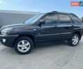 Черный Киа Sportage, объемом двигателя 2 л и пробегом 150 тыс. км за 10000 $, фото 3 на Automoto.ua
