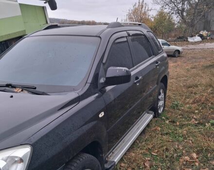 Черный Киа Sportage, объемом двигателя 2 л и пробегом 167 тыс. км за 9000 $, фото 2 на Automoto.ua