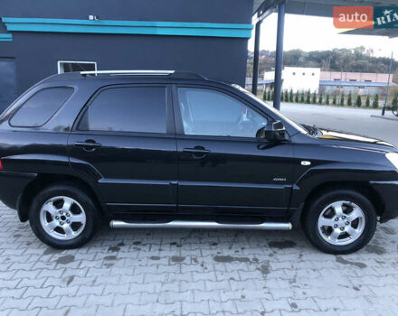 Черный Киа Sportage, объемом двигателя 2 л и пробегом 290 тыс. км за 7200 $, фото 12 на Automoto.ua