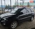 Черный Киа Sportage, объемом двигателя 2 л и пробегом 147 тыс. км за 8300 $, фото 1 на Automoto.ua