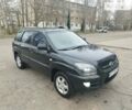 Черный Киа Sportage, объемом двигателя 2 л и пробегом 215 тыс. км за 8800 $, фото 4 на Automoto.ua