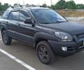 Черный Киа Sportage, объемом двигателя 2 л и пробегом 230 тыс. км за 11499 $, фото 1 на Automoto.ua