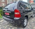 Черный Киа Sportage, объемом двигателя 2 л и пробегом 207 тыс. км за 7950 $, фото 16 на Automoto.ua