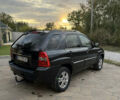 Черный Киа Sportage, объемом двигателя 2 л и пробегом 257 тыс. км за 10300 $, фото 12 на Automoto.ua