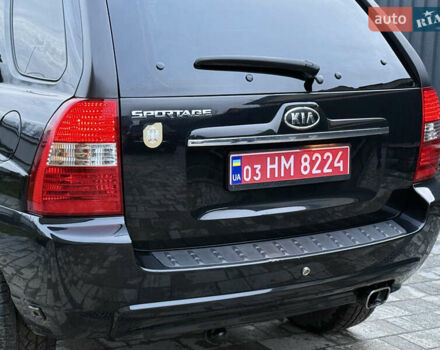 Чорний Кіа Sportage, об'ємом двигуна 2 л та пробігом 215 тис. км за 8600 $, фото 28 на Automoto.ua