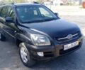 Черный Киа Sportage, объемом двигателя 2 л и пробегом 270 тыс. км за 7700 $, фото 1 на Automoto.ua