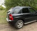 Черный Киа Sportage, объемом двигателя 2.7 л и пробегом 217 тыс. км за 6800 $, фото 3 на Automoto.ua