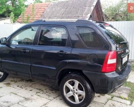 Черный Киа Sportage, объемом двигателя 2 л и пробегом 291 тыс. км за 6500 $, фото 7 на Automoto.ua