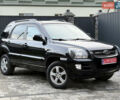 Чорний Кіа Sportage, об'ємом двигуна 2 л та пробігом 215 тис. км за 8600 $, фото 2 на Automoto.ua