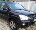 Черный Киа Sportage, объемом двигателя 2 л и пробегом 291 тыс. км за 6500 $, фото 11 на Automoto.ua