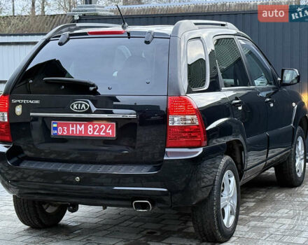 Чорний Кіа Sportage, об'ємом двигуна 2 л та пробігом 215 тис. км за 8600 $, фото 26 на Automoto.ua
