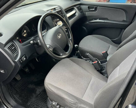 Черный Киа Sportage, объемом двигателя 1.98 л и пробегом 264 тыс. км за 6500 $, фото 45 на Automoto.ua