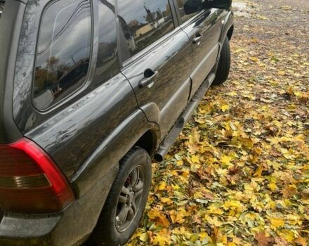 Чорний Кіа Sportage, об'ємом двигуна 2 л та пробігом 301 тис. км за 7300 $, фото 2 на Automoto.ua