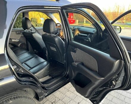 Черный Киа Sportage, объемом двигателя 2 л и пробегом 226 тыс. км за 8800 $, фото 5 на Automoto.ua