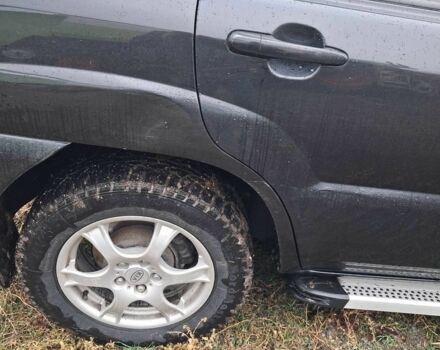 Черный Киа Sportage, объемом двигателя 2 л и пробегом 167 тыс. км за 9000 $, фото 11 на Automoto.ua