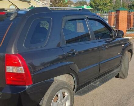 Чорний Кіа Sportage, об'ємом двигуна 2 л та пробігом 290 тис. км за 8200 $, фото 5 на Automoto.ua