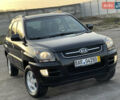Черный Киа Sportage, объемом двигателя 2 л и пробегом 129 тыс. км за 8650 $, фото 1 на Automoto.ua