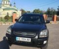 Чорний Кіа Sportage, об'ємом двигуна 2 л та пробігом 290 тис. км за 8200 $, фото 1 на Automoto.ua