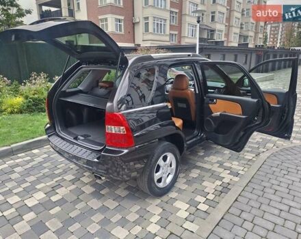 Черный Киа Sportage, объемом двигателя 2 л и пробегом 207 тыс. км за 7950 $, фото 25 на Automoto.ua