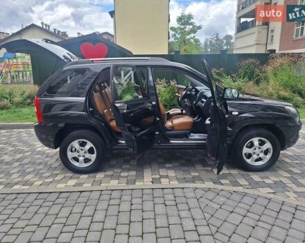 Черный Киа Sportage, объемом двигателя 2 л и пробегом 207 тыс. км за 7950 $, фото 30 на Automoto.ua