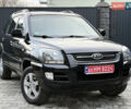 Чорний Кіа Sportage, об'ємом двигуна 2 л та пробігом 215 тис. км за 8600 $, фото 4 на Automoto.ua
