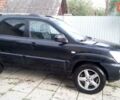 Черный Киа Sportage, объемом двигателя 2 л и пробегом 291 тыс. км за 6500 $, фото 13 на Automoto.ua