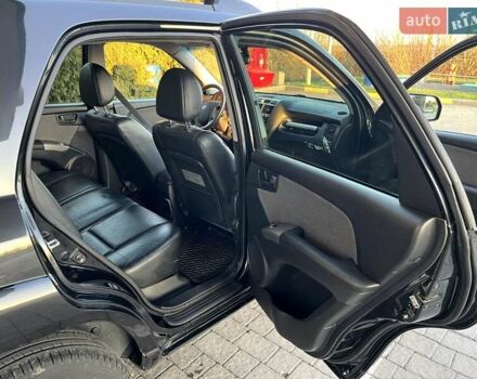 Черный Киа Sportage, объемом двигателя 2 л и пробегом 226 тыс. км за 8800 $, фото 3 на Automoto.ua