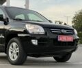 Черный Киа Sportage, объемом двигателя 2 л и пробегом 246 тыс. км за 7700 $, фото 1 на Automoto.ua