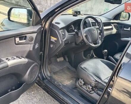 Черный Киа Sportage, объемом двигателя 2 л и пробегом 270 тыс. км за 7700 $, фото 10 на Automoto.ua