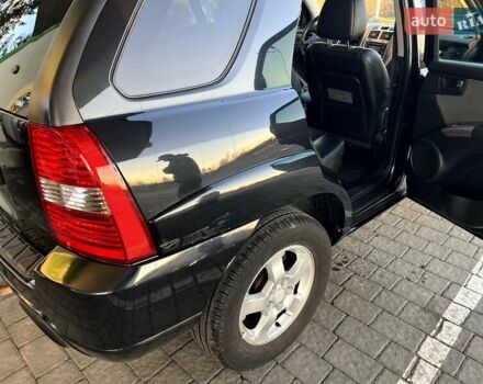 Черный Киа Sportage, объемом двигателя 2 л и пробегом 226 тыс. км за 8800 $, фото 5 на Automoto.ua