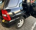 Черный Киа Sportage, объемом двигателя 2 л и пробегом 226 тыс. км за 8800 $, фото 5 на Automoto.ua
